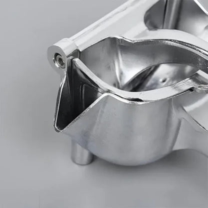 JuicePress™ – Exprimidor Metálico para Jugo Natural y Saludable